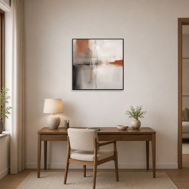 Home office featuring an abstract square composition in earth colors.