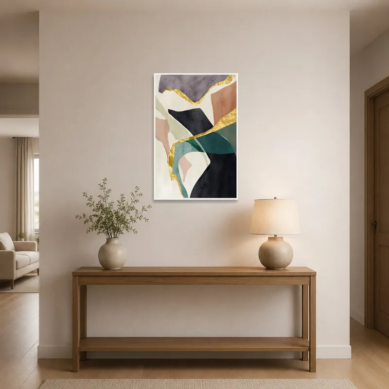Entrance hall showcasing abstract artwork with gold highlights.