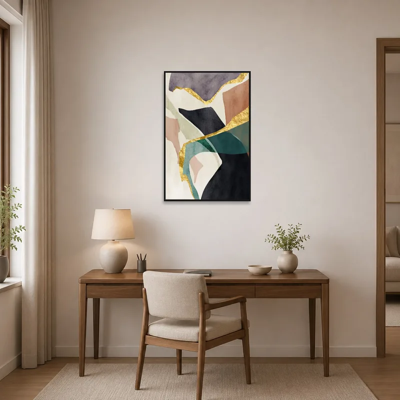 Home office displaying gold-accented abstract artwork.