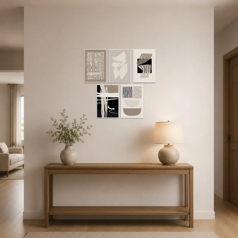 Entrance hall featuring an abstract geometric art set in earth tones welcoming guests.