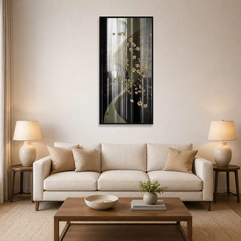 A gold floral abstract art piece on a striped background displayed above a modern sofa in a living room.