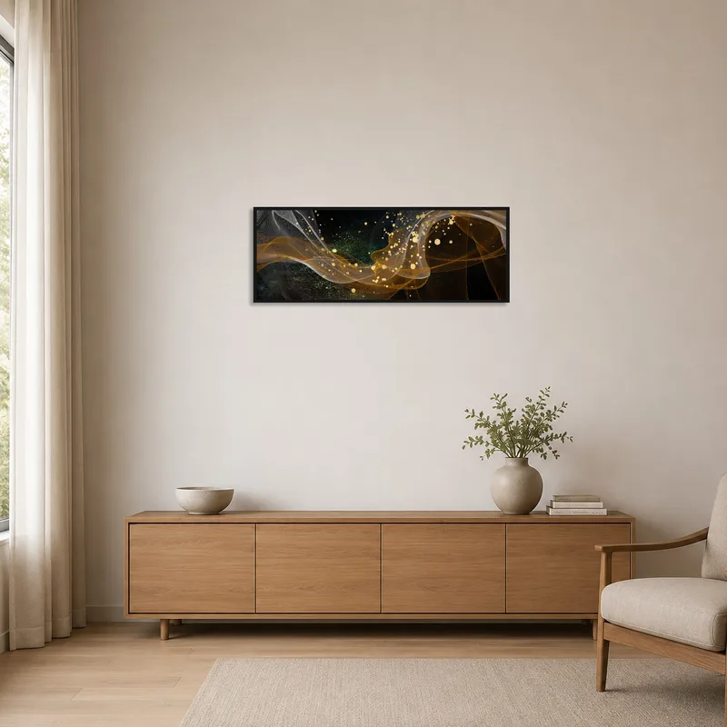 Abstract golden wave art print on a clean white wall in a minimalist setting.