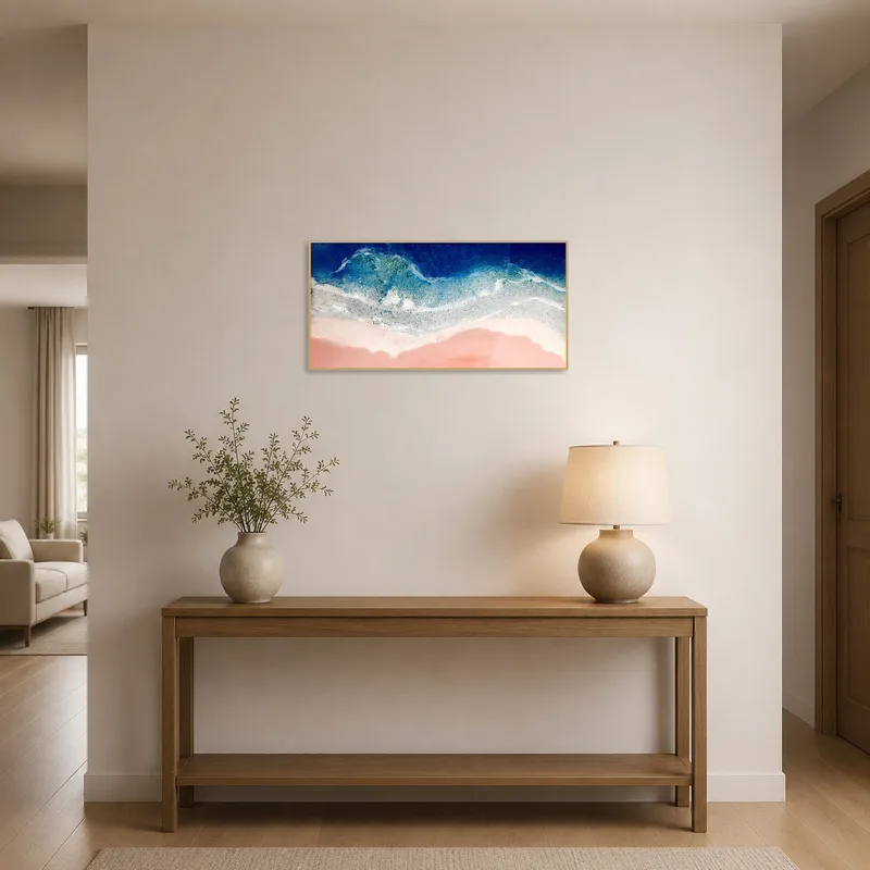 Art of sandy shoreline displayed in an entrance hall.