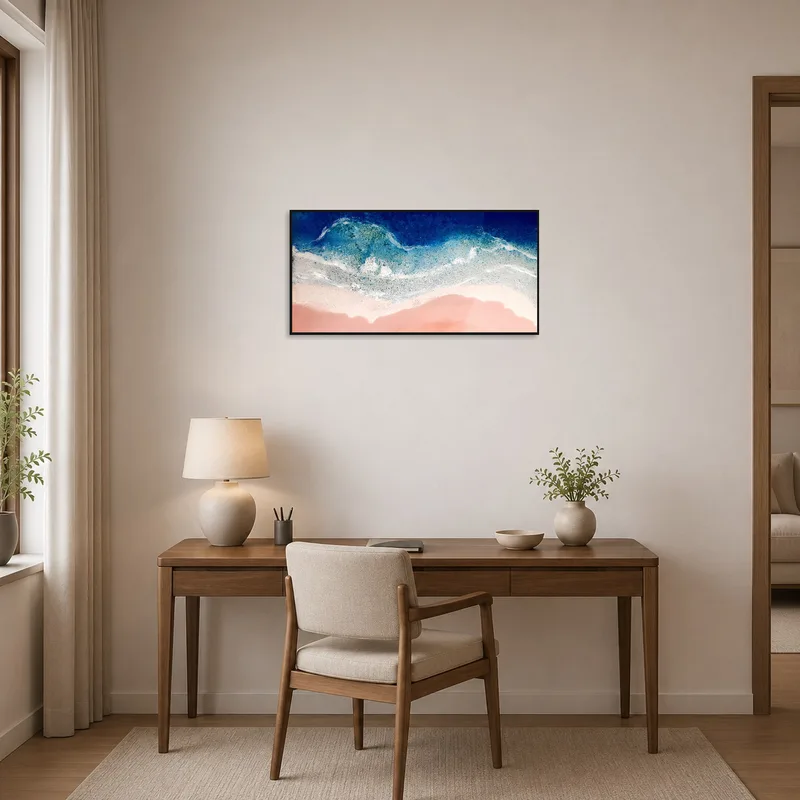 Ocean shoreline art energizes a productive home office.