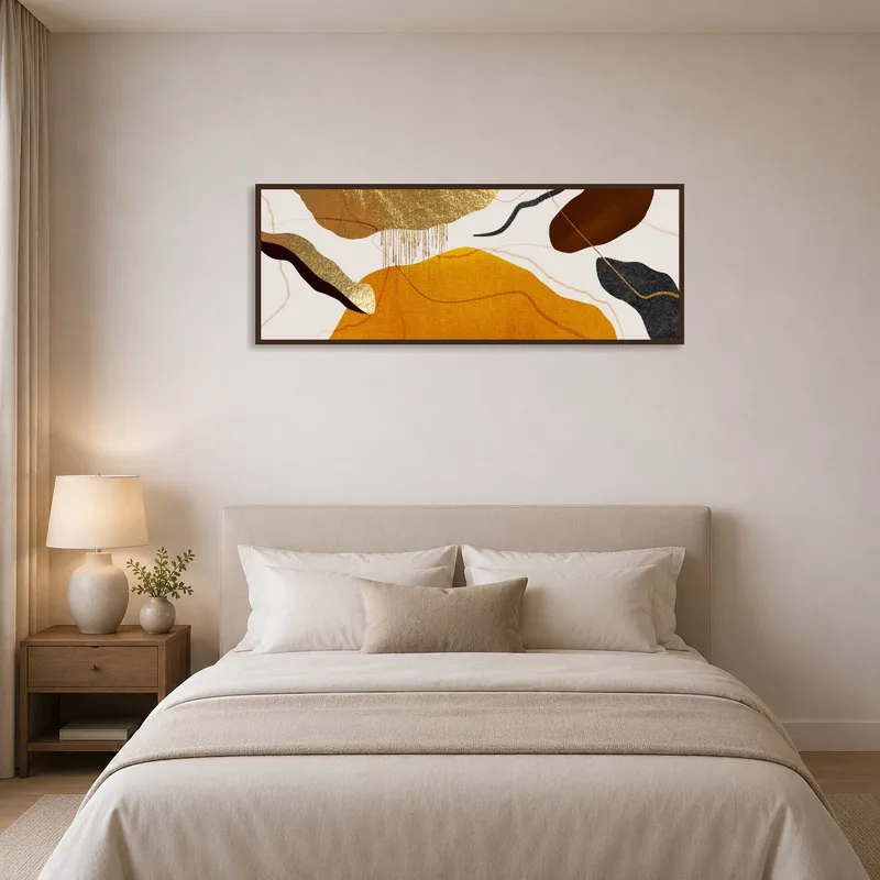 Earthy abstract artwork brings tranquility to the bedroom decor.