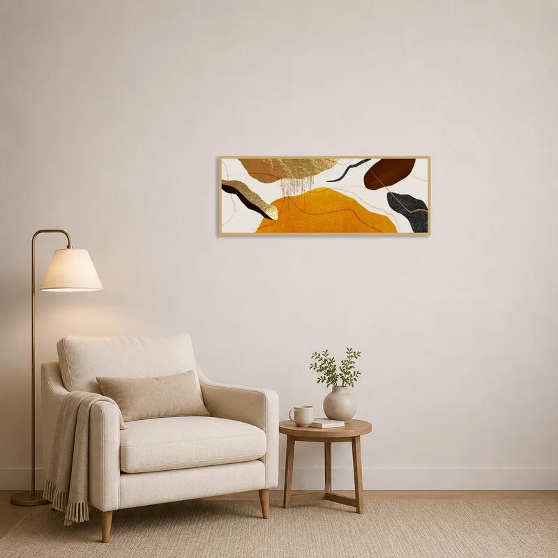Subtle abstract art with earthy shades enhances the cozy reading nook.