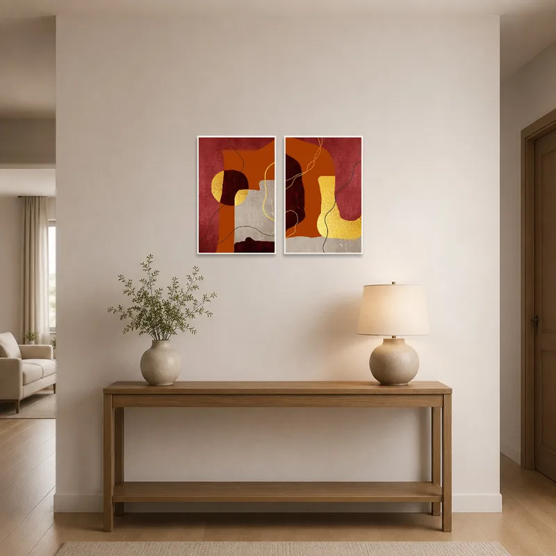 Bold red and gold geometric art set greeting guests in an entrance hall.