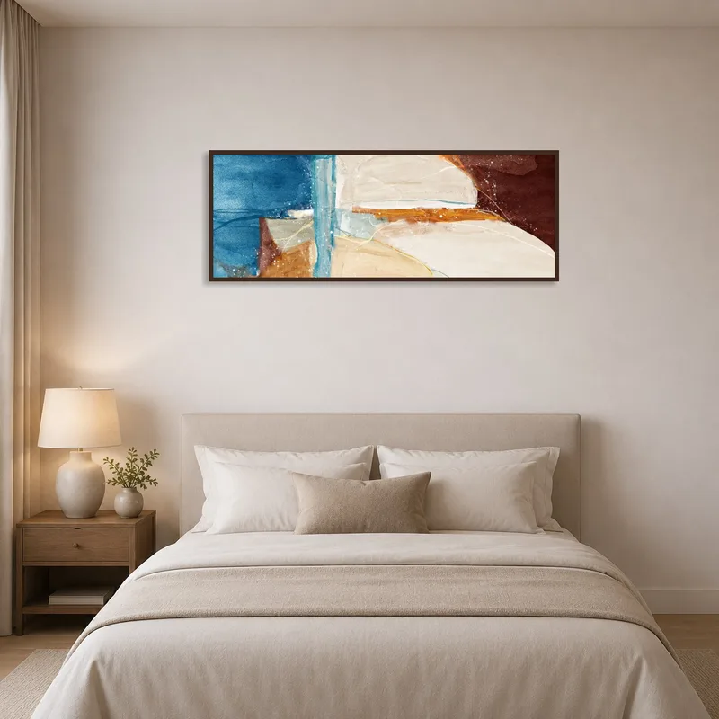 Abstract landscape piece brings calmness to a serene bedroom atmosphere.