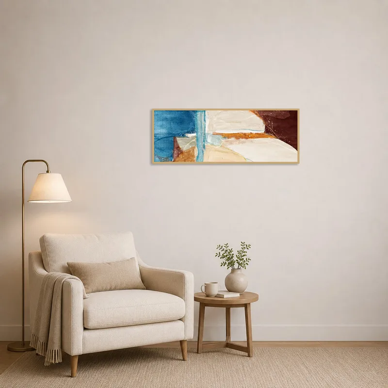 Earth-toned watercolor landscape enhances a tranquil reading corner.