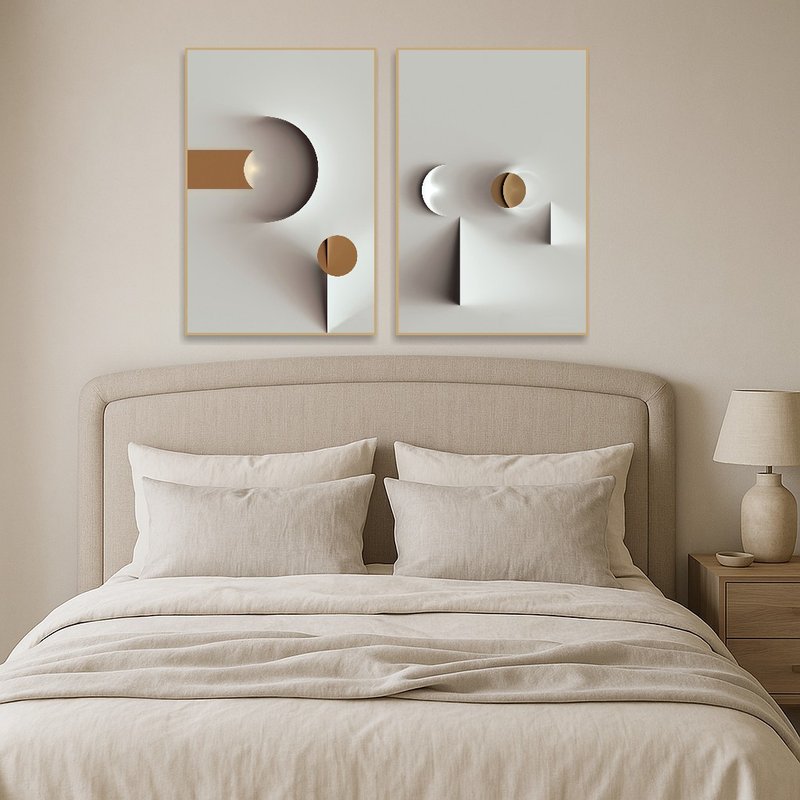 Calming geometric abstract art in neutral hues hung in a bedroom.