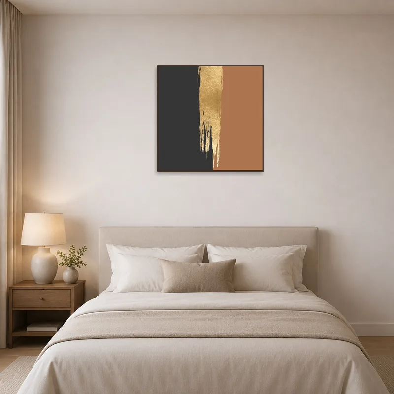 Warm-toned abstract artwork near a bed for a calming bedroom vibe.