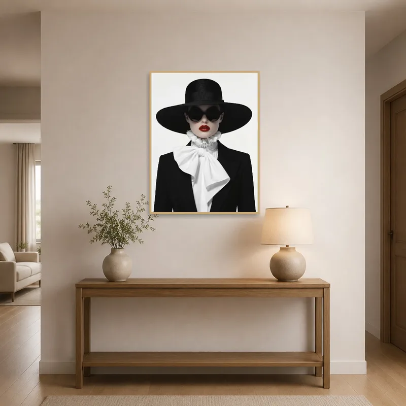 Entrance hall displaying art print of a woman with a black hat and red lips.