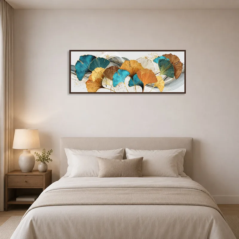 Panoramic artwork of ginkgo leaves enhances a serene bedroom.