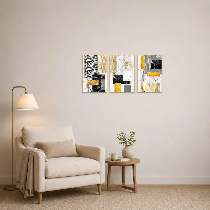A cozy reading corner adorned with a striking gold and marble abstract triptych.