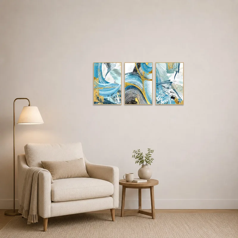 Intriguing abstract triptych adding elegance to a cozy reading corner with a plush armchair.