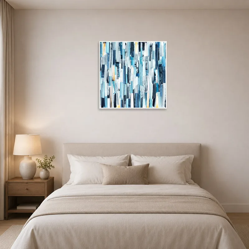 Vertical abstract artwork in a bedroom, bringing a modern touch above a bed with soft lighting.