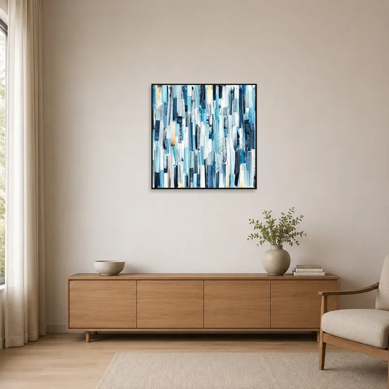 Vertical blue abstract piece on a minimalist wall, adding a splash of color to a simple setting.