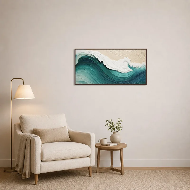 Reading corner with cozy chair and ocean wave art on wall.