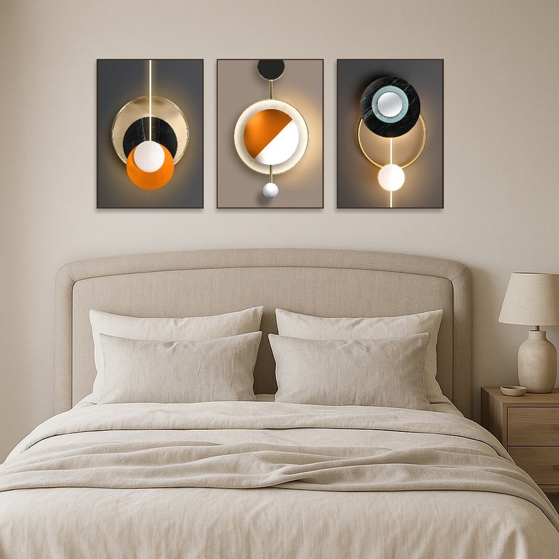 Geometric abstract triptych art set on a bedroom wall complementing sleek furniture.
