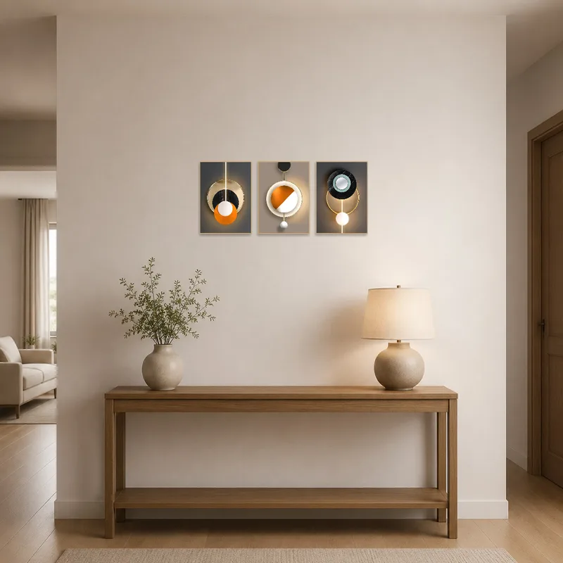 Geometric art triptych featuring bold circles greeting visitors in a sophisticated entrance hall.
