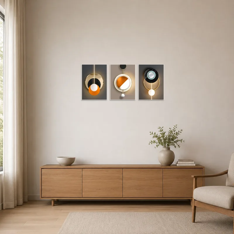 Bold circle art triptych accentuating a minimalist room with clean lines and neutral tones.