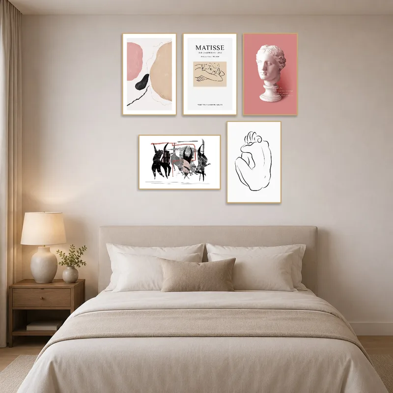 Abstract and classical art creating a serene and stylish bedroom retreat.