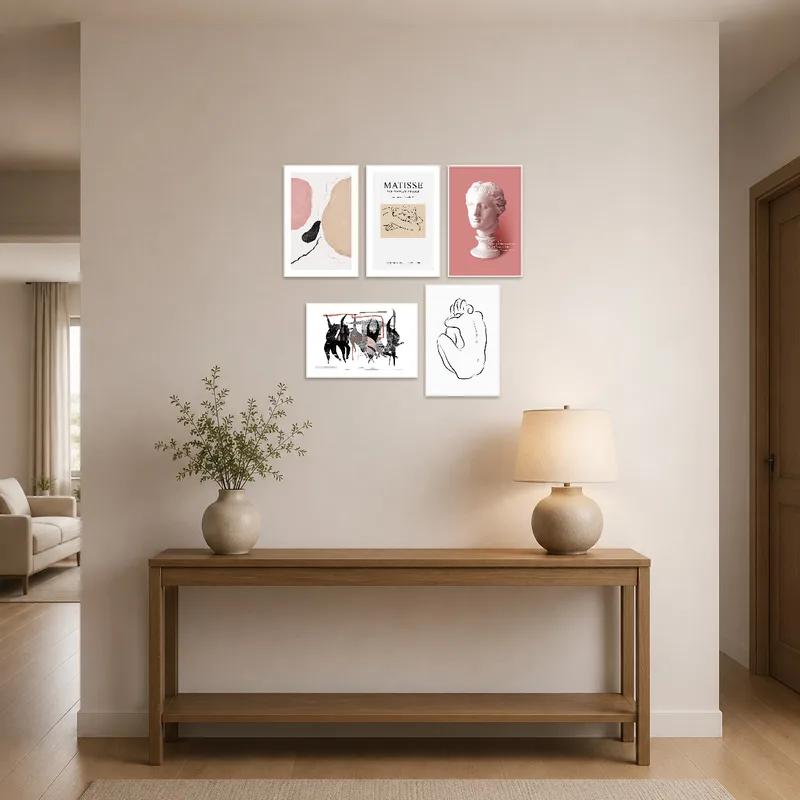 Elegant art collection enhancing the entrance hall's welcoming ambiance.