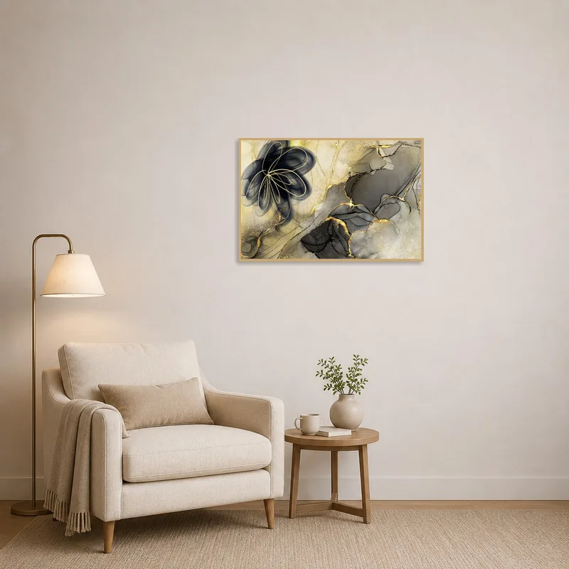 Reading corner enhanced by the elegance of abstract floral art in gold and black.
