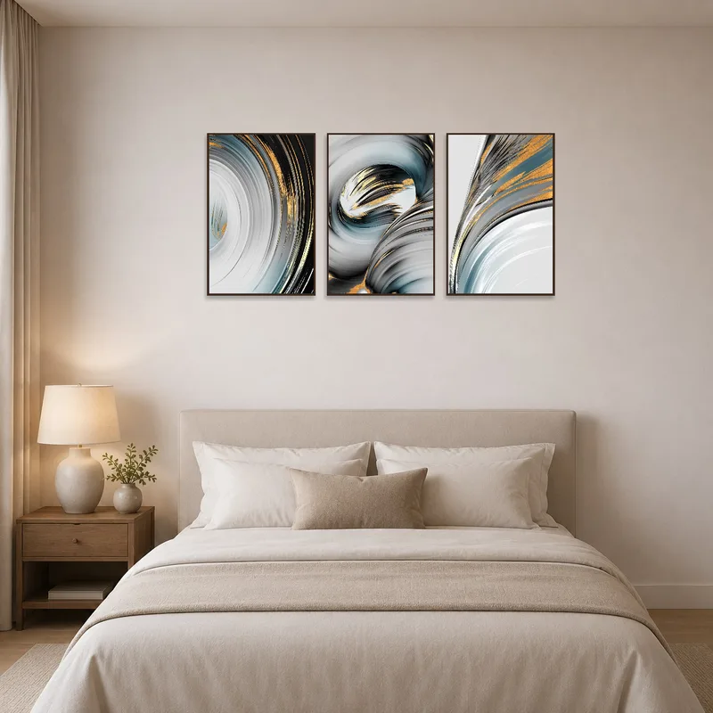 Triptych of swirling patterns adding elegance above the bed.
