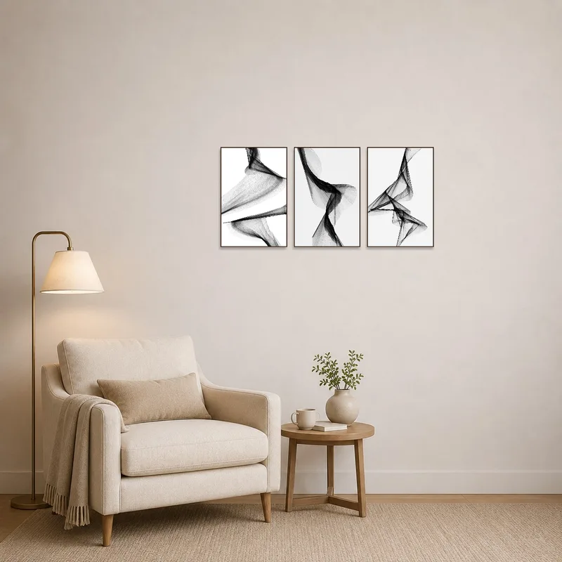 Stylish abstract triptych in a cozy reading corner.
