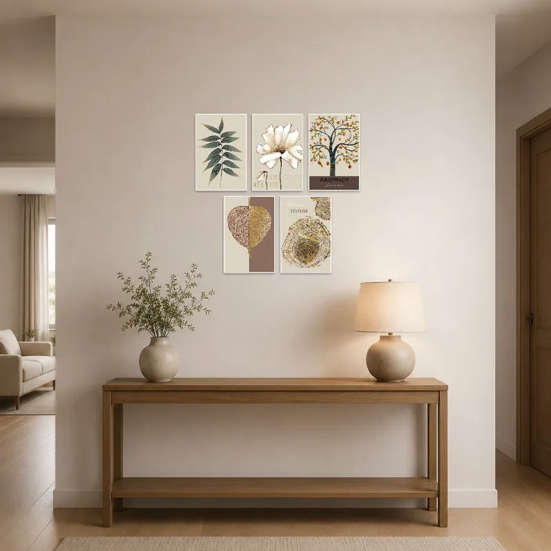 Artwork with botanical and abstract textures adorns an entrance hall.