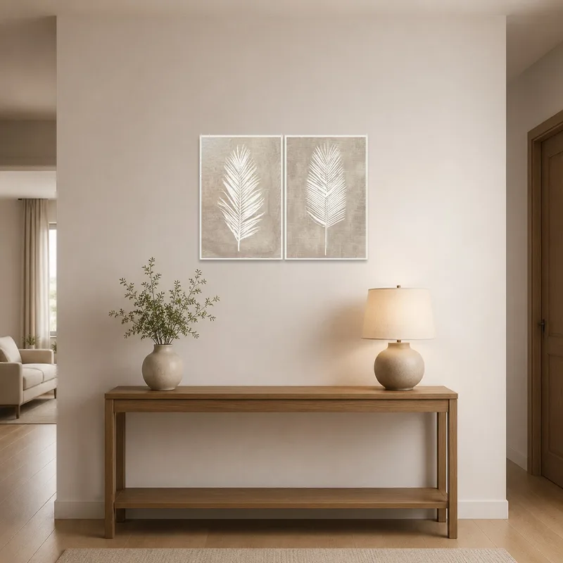 Elegant leaf art set enhances the entrance hall's welcoming feel.