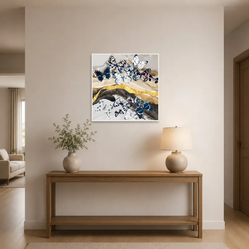 Entrance hall adorned with a butterfly collage and golden hues.