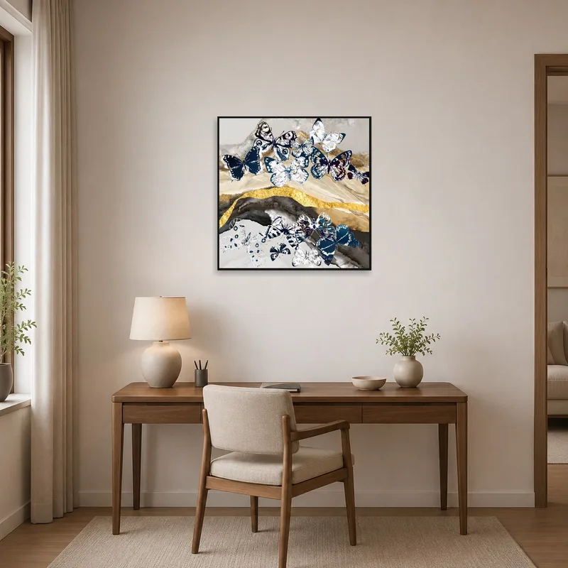 Home office with a sophisticated butterfly collage and gold texture.