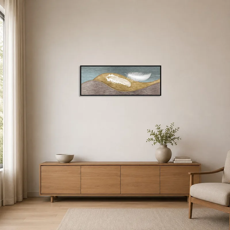 Feather motif art with textured waves complements minimalist room elements.
