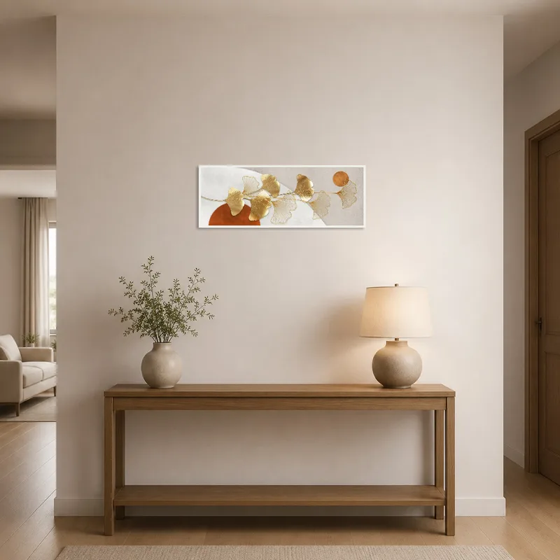 Stylish Ginkgo art hanging in an entrance hall with a sleek console table.