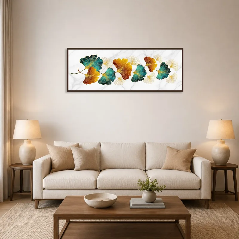 Ginkgo leaf panoramic print above a modern sofa in a stylish living room.