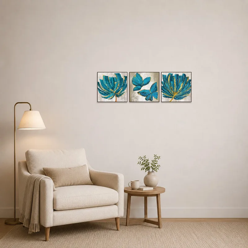 Reading corner adorned with elegant teal botanical artwork featuring gold details.