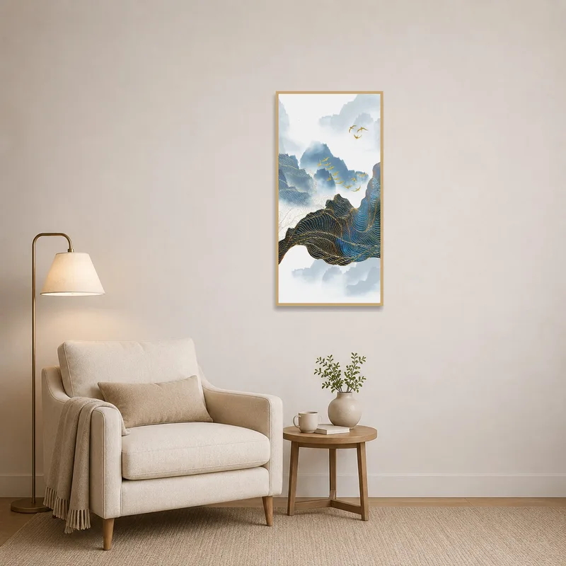 A calming mountain landscape with birds brightens up the reading corner over a cozy armchair.