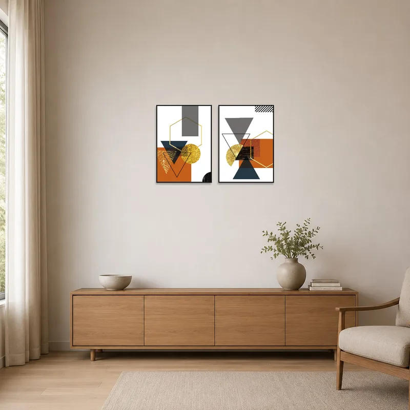 Sleek abstract art set with gold and earth tones complements a minimalist room's simple aesthetic.
