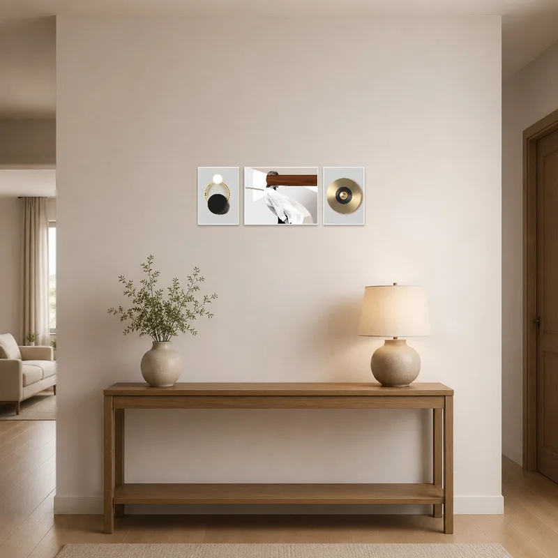 Entrance hall displaying a geometric and abstract triptych set as a focal point.