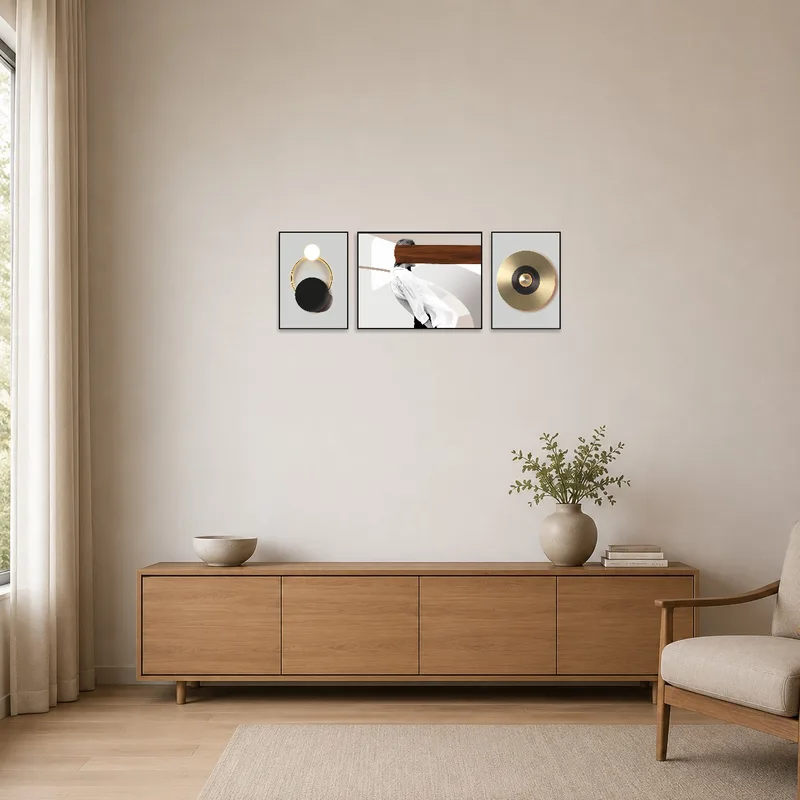 Minimalist space with a geometric and abstract triptych set adding a touch of color.