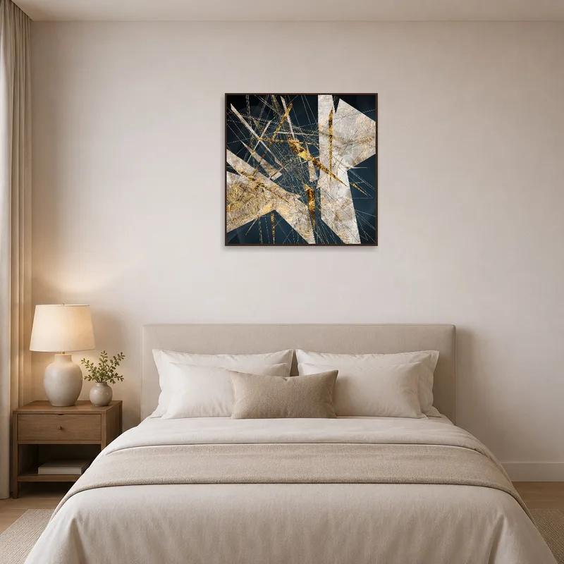 Geometric art in gold tones enhances the serene atmosphere of a bedroom.