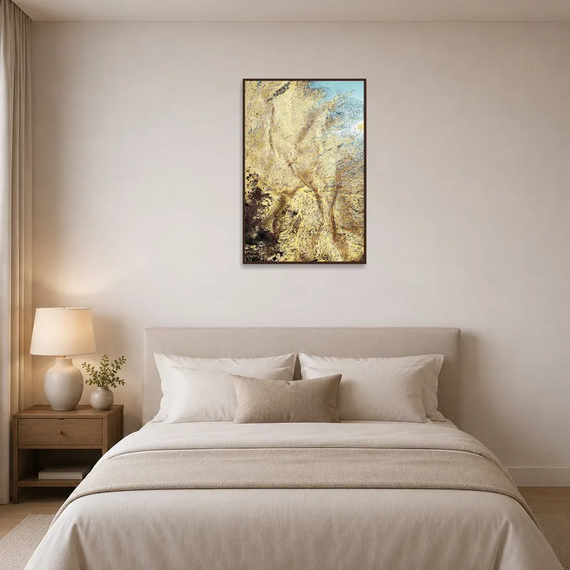 Golden abstract art creating a serene bedroom atmosphere.
