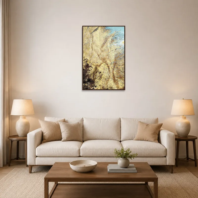 Golden abstract textured canvas in a stylish living room setting.