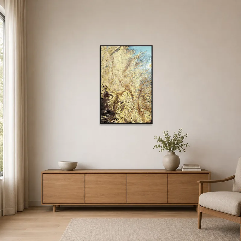 Golden abstract art complementing a minimalist space.