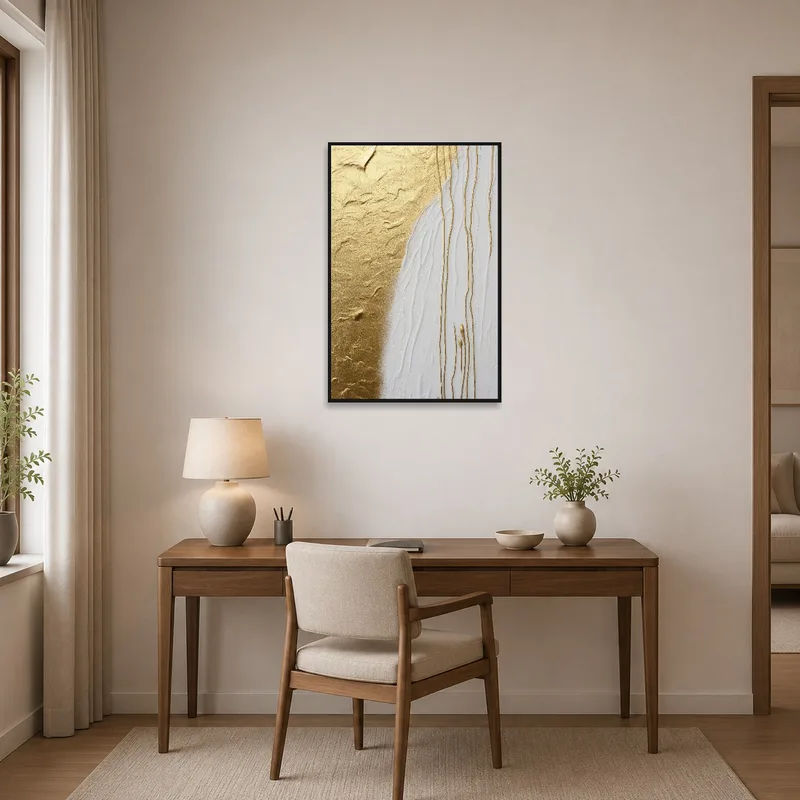Home office with a splash of creativity from textured golden and white artwork.