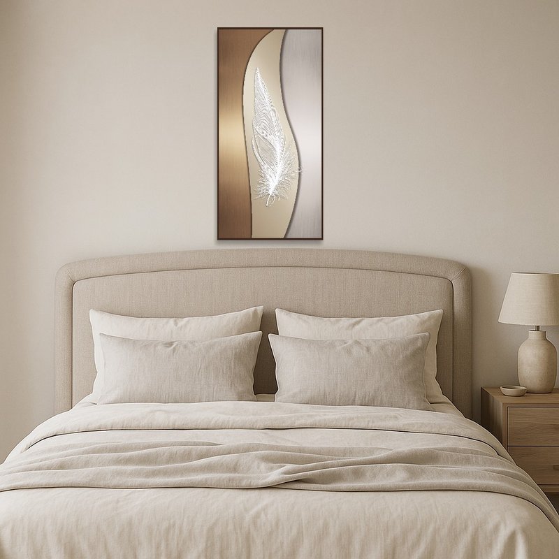 Metallic feather piece bringing sophistication to the bedroom.