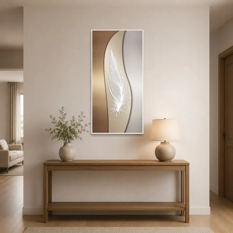 Entrance hall adorned with elegant feather artwork above a sleek console table.
