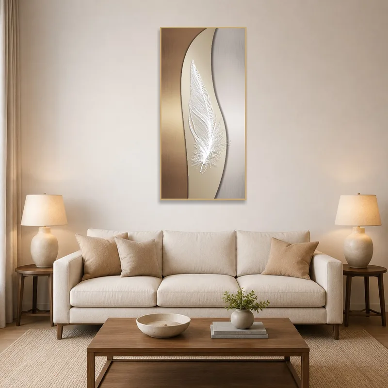 Elegant feather artwork on metallic background in a cozy living room next to a beige sofa.